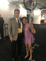 Herb Vincent with renowned halftime entertainer Red Panda.